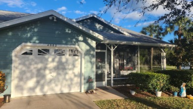 ENJOY THIS SPACIOUS CORNER VILLA OFFERING ITS INCREASED PRIVACY on Gator Trace Golf and Country Club in Florida - for sale on GolfHomes.com, golf home, golf lot