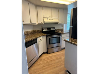 Stunning 2 Bedroom, 2 Bath Corner Unit in Breezes at Palm Aire! on Palm-Aire Country Club and Resort - Palms in Florida - for sale on GolfHomes.com, golf home, golf lot