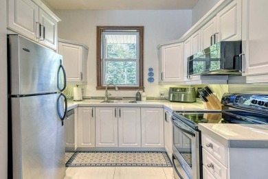 Aiglon prestigious center unit  townhome with upgrades, spacious on Golf Manitou in  - for sale on GolfHomes.com, golf home, golf lot