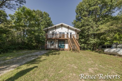 Discover country living in this 3-bedroom, 1.5-bath contemporary on Thoroughbred Golf Club in Michigan - for sale on GolfHomes.com, golf home, golf lot