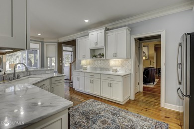 Nestled on a quiet street beneath stunning live oaks, this on The Golf Club at Pleasant Point Plantation in South Carolina - for sale on GolfHomes.com, golf home, golf lot