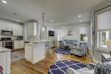 Nestled on a quiet street beneath stunning live oaks, this on The Golf Club at Pleasant Point Plantation in South Carolina - for sale on GolfHomes.com, golf home, golf lot