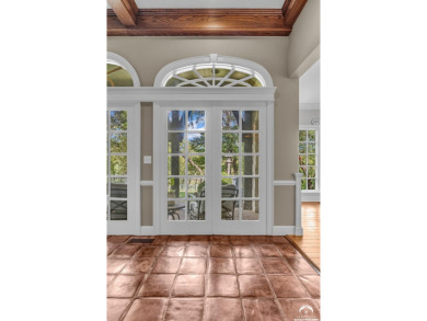 Welcome to this remarkable Tudor-style home situated on just on Alvamar Country Club in Kansas - for sale on GolfHomes.com, golf home, golf lot