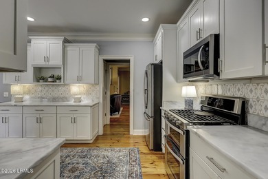 Nestled on a quiet street beneath stunning live oaks, this on The Golf Club at Pleasant Point Plantation in South Carolina - for sale on GolfHomes.com, golf home, golf lot