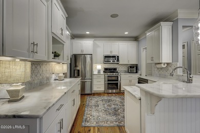 Nestled on a quiet street beneath stunning live oaks, this on The Golf Club at Pleasant Point Plantation in South Carolina - for sale on GolfHomes.com, golf home, golf lot