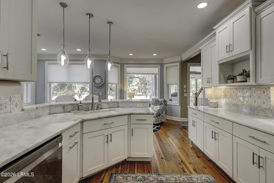 Nestled on a quiet street beneath stunning live oaks, this on The Golf Club at Pleasant Point Plantation in South Carolina - for sale on GolfHomes.com, golf home, golf lot