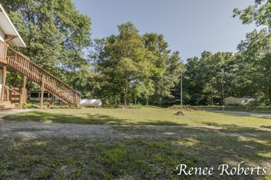 Discover country living in this 3-bedroom, 1.5-bath contemporary on Thoroughbred Golf Club in Michigan - for sale on GolfHomes.com, golf home, golf lot