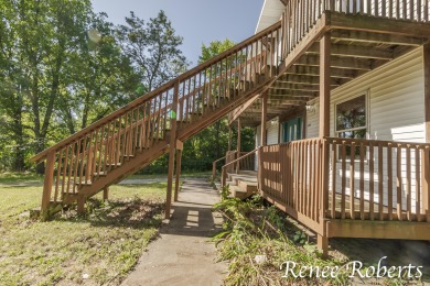 Discover country living in this 3-bedroom, 1.5-bath contemporary on Thoroughbred Golf Club in Michigan - for sale on GolfHomes.com, golf home, golf lot