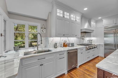 Welcome to this remarkable Tudor-style home situated on just on Alvamar Country Club in Kansas - for sale on GolfHomes.com, golf home, golf lot