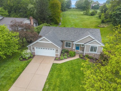 Built in 2014 and tastefully remodeled in 2020, this 4-bedroom on Centennial Country Club in Michigan - for sale on GolfHomes.com, golf home, golf lot