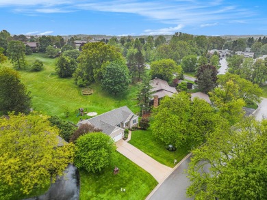Built in 2014 and tastefully remodeled in 2020, this 4-bedroom on Centennial Country Club in Michigan - for sale on GolfHomes.com, golf home, golf lot