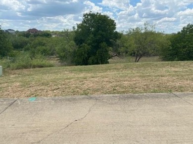 BUY NOW AND BUILD LATER.  This vacant lot is located in The on Tangle Ridge Golf Club in Texas - for sale on GolfHomes.com, golf home, golf lot