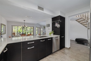 EXQUISITELY REMODELED two-story townhome in the heart of the on East Lake Woodlands Country Club in Florida - for sale on GolfHomes.com, golf home, golf lot