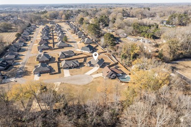 Beautiful and well maintained home located in a quiet culdesac on Big Oaks Golf Club in Mississippi - for sale on GolfHomes.com, golf home, golf lot