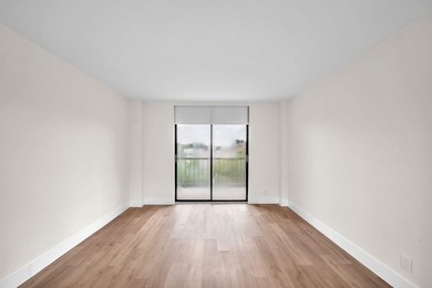 Beautiful fully renovated 2-bedroom, 2-bath penthouse featuring on The Club at Emerald Hills in Florida - for sale on GolfHomes.com, golf home, golf lot