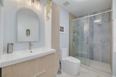 EXQUISITELY REMODELED two-story townhome in the heart of the on East Lake Woodlands Country Club in Florida - for sale on GolfHomes.com, golf home, golf lot