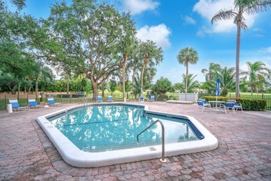Beautiful fully renovated 2-bedroom, 2-bath penthouse featuring on The Club at Emerald Hills in Florida - for sale on GolfHomes.com, golf home, golf lot