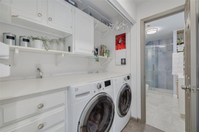 EXQUISITELY REMODELED two-story townhome in the heart of the on East Lake Woodlands Country Club in Florida - for sale on GolfHomes.com, golf home, golf lot