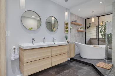 EXQUISITELY REMODELED two-story townhome in the heart of the on East Lake Woodlands Country Club in Florida - for sale on GolfHomes.com, golf home, golf lot