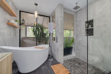 EXQUISITELY REMODELED two-story townhome in the heart of the on East Lake Woodlands Country Club in Florida - for sale on GolfHomes.com, golf home, golf lot
