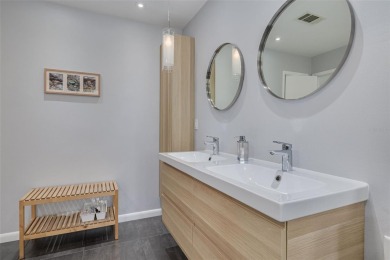 EXQUISITELY REMODELED two-story townhome in the heart of the on East Lake Woodlands Country Club in Florida - for sale on GolfHomes.com, golf home, golf lot