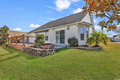 A charming three-bedroom, two-bathroom ranch-style home with a on Heron Point Golf Club in South Carolina - for sale on GolfHomes.com, golf home, golf lot