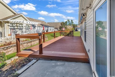 A charming three-bedroom, two-bathroom ranch-style home with a on Heron Point Golf Club in South Carolina - for sale on GolfHomes.com, golf home, golf lot