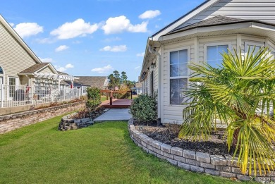 A charming three-bedroom, two-bathroom ranch-style home with a on Heron Point Golf Club in South Carolina - for sale on GolfHomes.com, golf home, golf lot