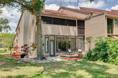 EXQUISITELY REMODELED two-story townhome in the heart of the on East Lake Woodlands Country Club in Florida - for sale on GolfHomes.com, golf home, golf lot