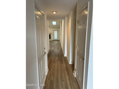 The upgrades look fantastic! NEW FLOORING on the main level; on River Bend Golf and Country Club in North Carolina - for sale on GolfHomes.com, golf home, golf lot