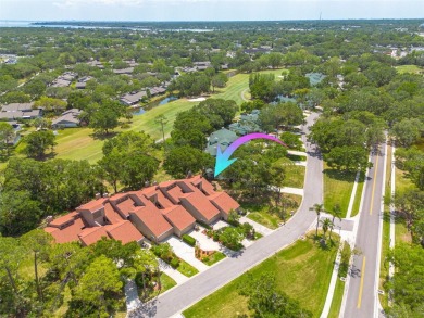 EXQUISITELY REMODELED two-story townhome in the heart of the on East Lake Woodlands Country Club in Florida - for sale on GolfHomes.com, golf home, golf lot