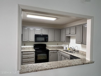 The upgrades look fantastic! NEW FLOORING on the main level; on River Bend Golf and Country Club in North Carolina - for sale on GolfHomes.com, golf home, golf lot