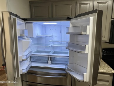 The upgrades look fantastic! NEW FLOORING on the main level; on River Bend Golf and Country Club in North Carolina - for sale on GolfHomes.com, golf home, golf lot