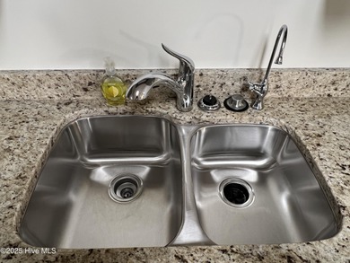 The upgrades look fantastic! NEW FLOORING on the main level; on River Bend Golf and Country Club in North Carolina - for sale on GolfHomes.com, golf home, golf lot