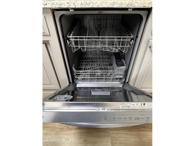 The upgrades look fantastic! NEW FLOORING on the main level; on River Bend Golf and Country Club in North Carolina - for sale on GolfHomes.com, golf home, golf lot