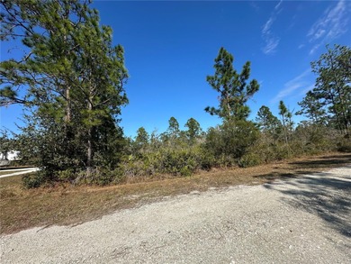 Build your home on a ONE-ACRE CORNER LOT! The lot is on Indian Lake Estates Golf and Country Club in Florida - for sale on GolfHomes.com, golf home, golf lot