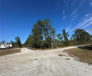 Build your home on a ONE-ACRE CORNER LOT! The lot is on Indian Lake Estates Golf and Country Club in Florida - for sale on GolfHomes.com, golf home, golf lot