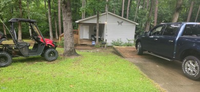 OWNER FINANCING AVAILABLE !!!  This two bedroom, one bath on River Golf and County Club at Lake Royale in North Carolina - for sale on GolfHomes.com, golf home, golf lot