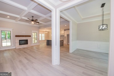 Nestled on 2.22 acres, this exquisite new construction two-story on Perry Country Club in Georgia - for sale on GolfHomes.com, golf home, golf lot