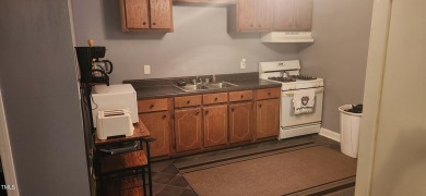 OWNER FINANCING AVAILABLE !!!  This two bedroom, one bath on River Golf and County Club at Lake Royale in North Carolina - for sale on GolfHomes.com, golf home, golf lot
