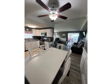 Welcome to this beautifully updated home located in the gated on Lake Fairways Country Club in Florida - for sale on GolfHomes.com, golf home, golf lot