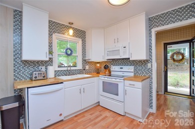 This original Tega Cay contemporary is move in ready and a on Tega Cay Golf Club in South Carolina - for sale on GolfHomes.com, golf home, golf lot