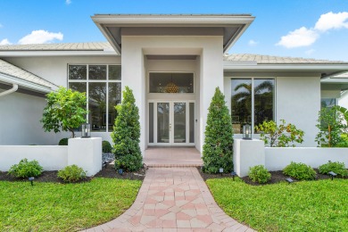 Discover this 4-bedroom plus office, 4.5-bathroom ranch style on Bocaire Country Club in Florida - for sale on GolfHomes.com, golf home, golf lot