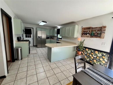 This 4-bedroom, 3-bath beauty in the desirable Fairway Estates on Bent Creek Golf Course in Missouri - for sale on GolfHomes.com, golf home, golf lot