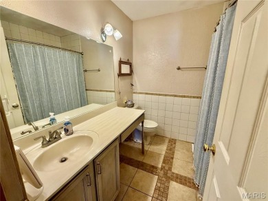 This 4-bedroom, 3-bath beauty in the desirable Fairway Estates on Bent Creek Golf Course in Missouri - for sale on GolfHomes.com, golf home, golf lot