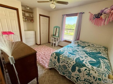 This 4-bedroom, 3-bath beauty in the desirable Fairway Estates on Bent Creek Golf Course in Missouri - for sale on GolfHomes.com, golf home, golf lot