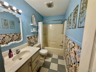 This 4-bedroom, 3-bath beauty in the desirable Fairway Estates on Bent Creek Golf Course in Missouri - for sale on GolfHomes.com, golf home, golf lot