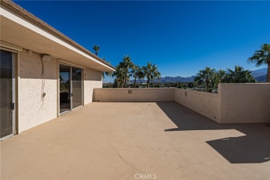 Experience luxury living in this exquisite penthouse located in on Desert Island Golf and Country Club in California - for sale on GolfHomes.com, golf home, golf lot