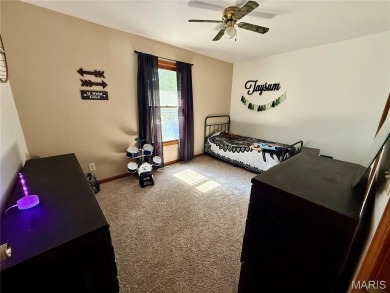 This 4-bedroom, 3-bath beauty in the desirable Fairway Estates on Bent Creek Golf Course in Missouri - for sale on GolfHomes.com, golf home, golf lot