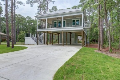 **Stunning New Home on Dauphin Island - A True Paradise Escape**
 on Isle Dauphine Club Golf Course in Alabama - for sale on GolfHomes.com, golf home, golf lot